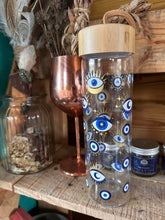Load image into Gallery viewer, All seeing eye glass bottle