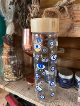 Load image into Gallery viewer, All seeing eye glass bottle